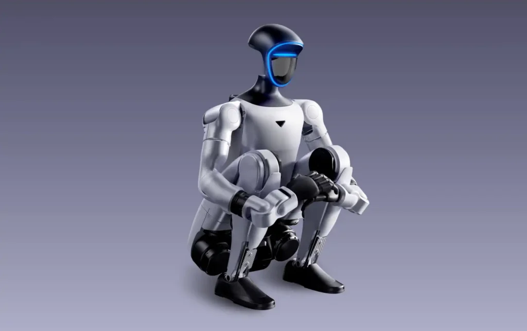 Robot humanoïde Unitree G1 accroupi, illustrant son amplitude articulaire